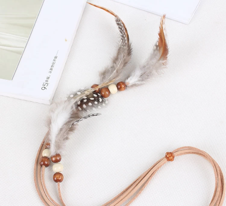White Spotted Feather Brown Hair Tie - Image 3